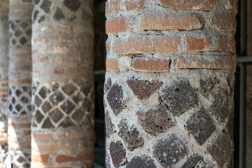 Details, mosaics, columns, stones among the ruins of the ancient Roman city of Pompeii, buried by the eruption of Vesuvius in 79 AD.