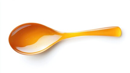 Amber liquid in orange spoon.