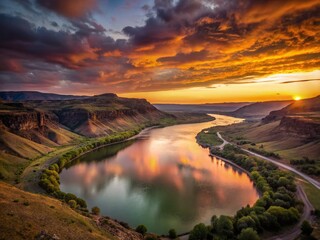 Naklejka premium Dramatic Sunset Over Snake River, Huntington, Oregon - Aerial Drone View