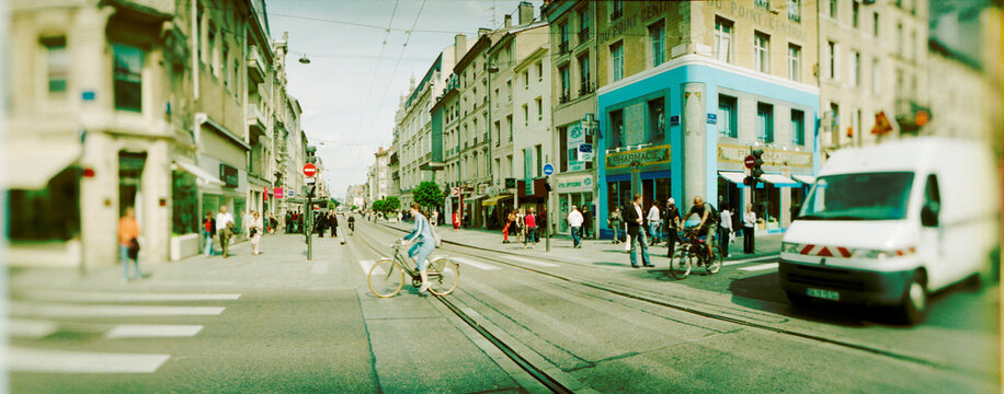 Busy street scene in a city, Nancy, Meurthe-et-Moselle, Lorraine, France.
