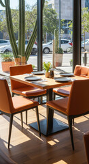 Obraz premium Stylish Restaurant Setting: Table for Four, Modern Decor, Natural Light, and City View. Fine Dining Experience Awaits!