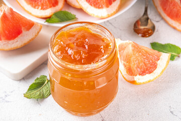 Homemade grapefruit jam in small jar