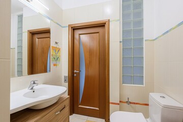 interior apartment room bathroom, sink, decorative elements, toilet