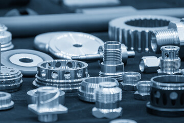 Close up scene the group of high precision parts in the light blue scene.