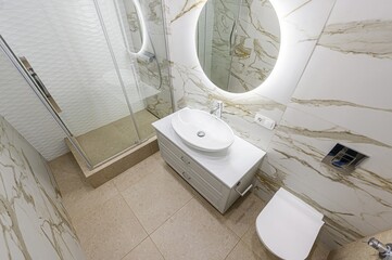interior apartment room bathroom, sink, decorative elements, toilet