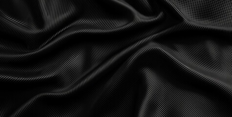 Fototapeta premium A close-up of luxurious black fabric with soft, flowing waves and a subtle texture.