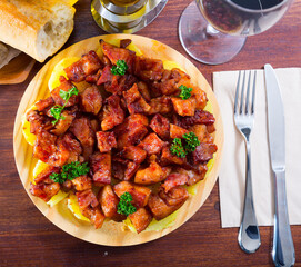 Spanish dish - roasted pig nose and cheeks