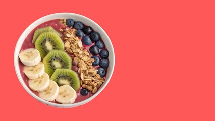 Fototapeta premium Vibrant Smoothie Bowl with Kiwi, Banana, and Blueberries