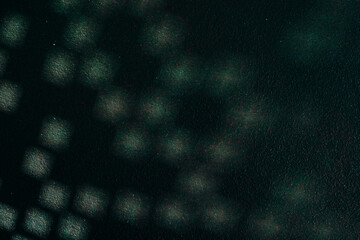 Abstract natural shadows on dark textured green background