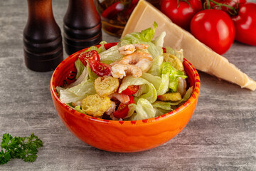 Tasty caesar salad with prawn