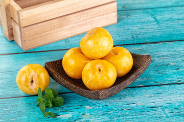 Raw ripe sweet yellow plums
