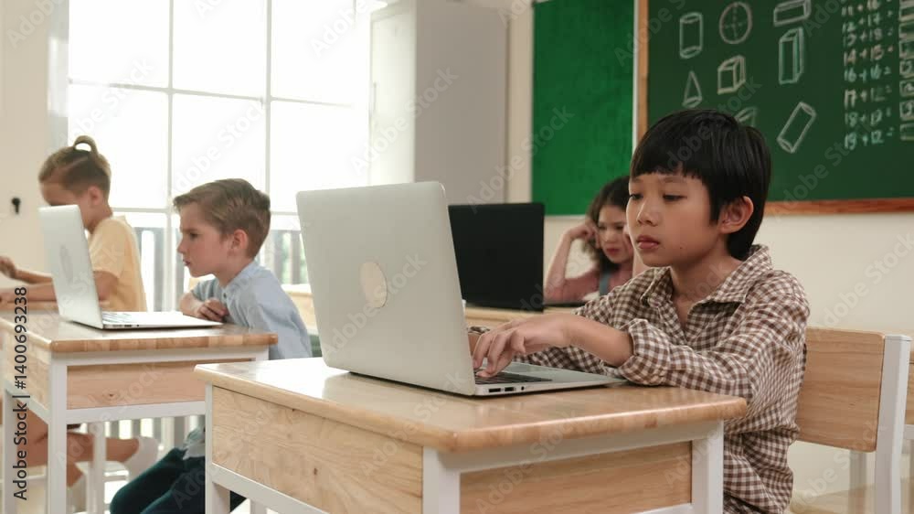Poster asian boy working on his laptop while learning about coding engineering prompt at stem technology cl
