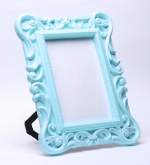 Ornamental blank photo frame on white background