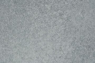 Light grey textured background with grainy surface minimalistic style