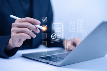 Business performance checklist concept, Businessman using laptop take an assessment,An businessman...