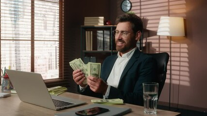 Happy excited cheerful smiling European business man counting money cash kissing banknotes love finance financial success at table rich male manager banker bank credit guy entrepreneur businessman - Powered by Adobe