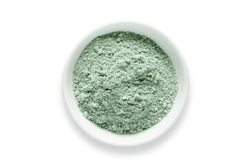Cosmetic clay for a face mask in a bowl. Isolated on a white background.