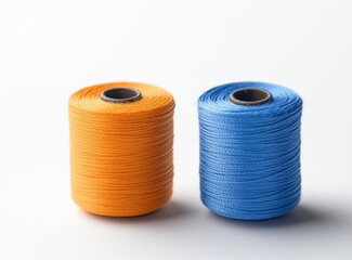 Two spools of colorful thread