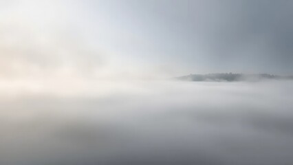 Fototapeta premium Cloudy morning mist rising from a serene lake, gray, mist, minimalism