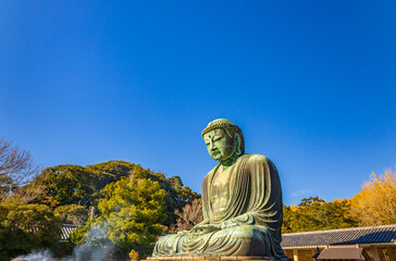 Ancient bronze statue of the Great Buddha Daibutsu at Kotoku-in temple in Kamakura, Japan. It is an important landmark and a popular destination for tourists.