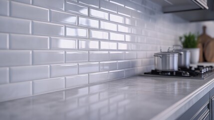 Tile setter positioning tiles in a kitchen backsplash. Featuring precision and style