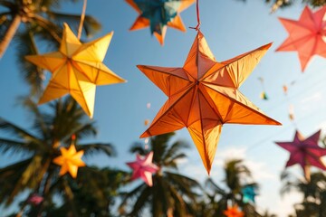 Colorful star lanterns hang in tropical setting