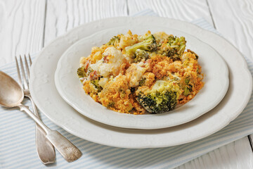 broccoli cauliflower casserole on plate, top view