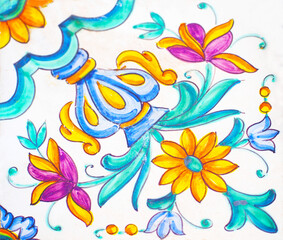 Detail of the traditional tiles from facade of old house. Decorative tiles.Valencian traditional tiles. Floral ornament. 