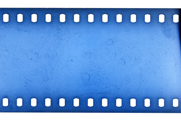 Dusty and grungy 35mm film texture or surface. Perforated scratched camera film isolated on white background.