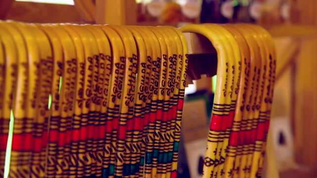 Various Decorative Walking Sticks in the Souvenir Shop. Souvenir, Memento or Keepsake is an Object a Person Acquires for the Memories the Owner Associates with it.