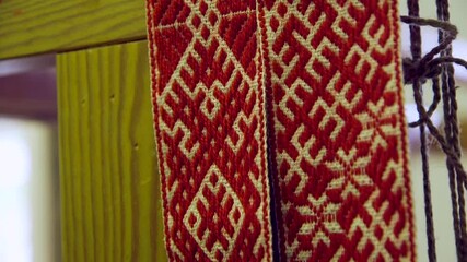 Latvian National Belt, White with Red and National Patterns. The Lielvarde Belt is a Traditional Element of Latvian National Costume, a Patterned Fabric Made of Linen and Wool.