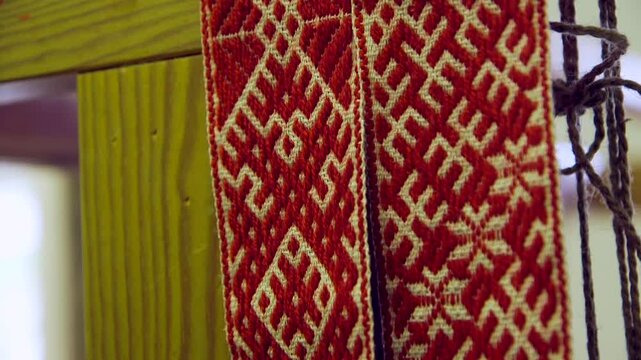Latvian National Belt, White with Red and National Patterns. The Lielvarde Belt is a Traditional Element of Latvian National Costume, a Patterned Fabric Made of Linen and Wool.