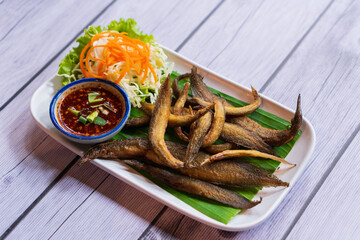 Fried soft-boned fish with spicy and sour dipping sauce