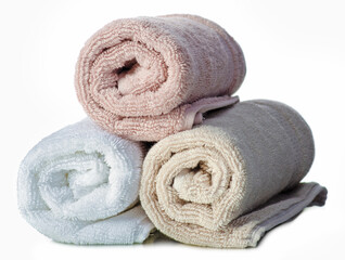 Stack folded rolls towels on white background isolation
