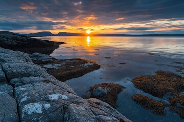 A radiant sunrise with fiery golden hues illuminating the still surface of the ocean, creating a peaceful and awe-inspiring morning scene