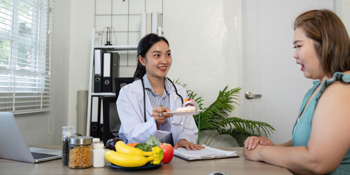 Nutrition and Wellness. A healthcare professional presents a healthy dessert option in a consultation.