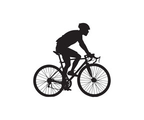 silhouette of a man riding a bike