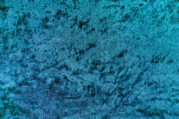 Rich deep teal blue velvet fabric texture with soft, plush pile