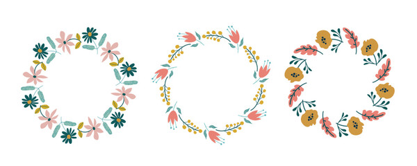 Spring floral circle frame set. Hand drawn botanical wreaths featuring branches, leaves, and flowers. Vector isolated illustrations perfect for wedding invitations, cards, and logos.