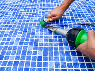 Pool liner working. Plastic Welding Machine. Welding plastic coverings for pool.Vinyl cloth...