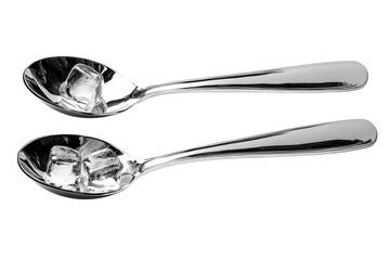 Two gleaming spoons hold ice cubes a refreshing still life against a dramatic black backdrop Polished metal reflects
