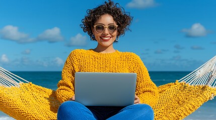 Woman Working on Laptop at the Beach