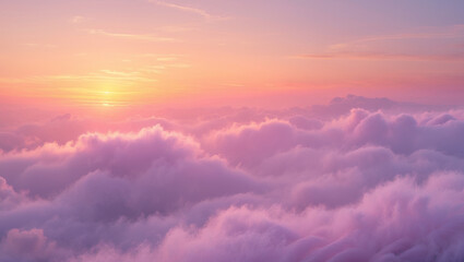 Fototapeta premium A breathtaking sunset paints the sky in soft pastel hues, a sea of fluffy clouds bathed in warm, golden light creating a dreamy, ethereal landscape.