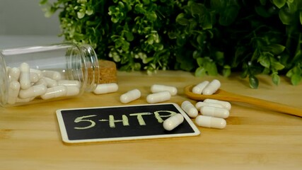 5-HTP sleep supplement capsules. Selective Focus.