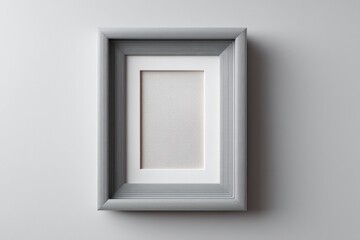 showcase blank photo frame against plain white wall to emphasize minimalistic clean lines