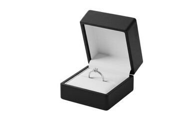 Gold ring in a jewelry box for engagement or anniversary isolated on white background