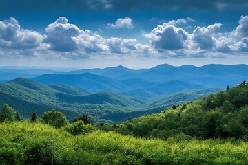 Fototapeta premium Tranquil hilltops fading into rugged green mountains in the distance