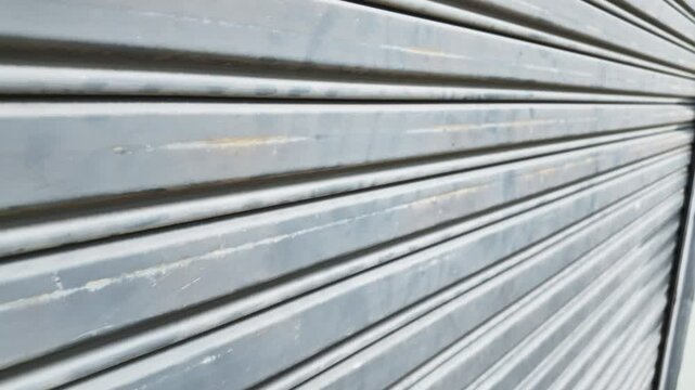 Exterior old metallic roller shutter door background