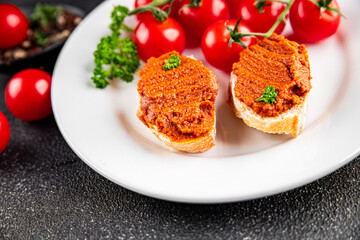 Pepper pate red pepper dip roasted vegetable hummus appetizer vegetables dish fresh gourmet food background on table rustic food top view copy space keto and paleo diet vegetarian and vegan food