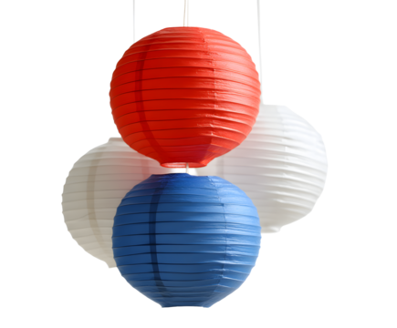 A vibrant display of red, white, and blue spherical paper lanterns hangs suspended, creating a festive and patriotic ambiance.